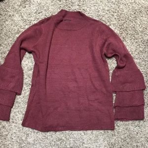 Ruffled sleeve sweater